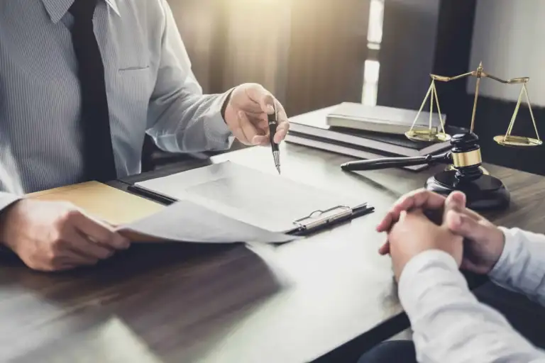 Real estate 3 - abogado Nerja, abogado Torrox, abogado Velez Malaga, abogado Torre del Mar consultation between businessman and male lawyer or judge consult having team meeting - abogado Nerja, abogado Torrox, abogado Velez Malaga, abogado Torre del Mar